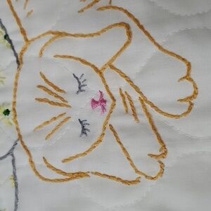 Baby hand enbroidery‎ quilt. Baby sleeping under a mushroom W/2 kittens.